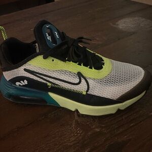 Nike Black and Green Sneakers with Breathable Mesh